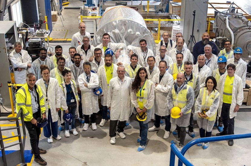 Director-General Pietro Barabaschi (left) joins ITER Organization and Fusion for Energy team members and representatives of industry in celebrating the arrival of the first of eight cryopumps. (Click to view larger version...)